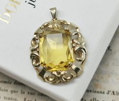 This listing is for a genuine 1930s vintage German citrine pendant, beautiful Art Deco design, very nicely done, in good used condition, measures approx. 27 x 32 mm. Nice genuine old piece with wear! Pendant measures approx. 27 x 32 mm. Total weight (with chain): 6.8 g Material: 835 silver, citrine Box on photos is NOT included! Vintage Citrine Yellow Gold Jewelry, Vintage Yellow Gold Citrine Jewelry, Vintage Citrine Gemstone Jewelry, Vintage Citrine Jewelry Gift, Art Deco Yellow Jewelry As A Gift, Art Deco Yellow Jewelry Gift, Antique Yellow Jewelry For Formal Occasions, Antique Yellow Jewelry For Formal Events, Art Deco Citrine Gold Jewelry