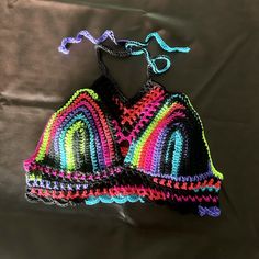 Crochet crop top is size medium/large Stretch Multicolor Crop Top For Music Festival, Multicolor Cropped Beachwear Crop Top, Black Fitted Cropped Crochet Top, Multicolor Triangle Halter Top For Festival, Multicolor Crop Top For Beach, Fitted Beachwear Tops For Festivals, Multicolor Triangle Top Crop Top For Beach Season, Multicolor Triangle Top Crop Top For Beach, Multicolor Triangle Crop Top For Beach Season