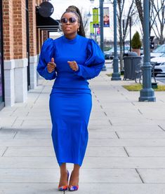 Have all eyes on you in this unreal dress. Give your wardrobe a seriously chic update with this dress. Featuring a blue material with puff sleeves , we're in love. style with heels or boots for a complete look. Model wearing medium Puff Sleeve Dress With Pleated Sleeves For Fall, Fitted Midi Dress With Gathered Sleeves For Fall, Fall Fitted Midi Dress With Gathered Sleeves, Fall Puff Sleeve Knee-length Dress With Pleated Sleeves, Fall Party Midi Dress With Balloon Sleeves, Trendy Fitted Midi Dress With Puff Sleeves, Chic Balloon Sleeve Midi Dress For Fall, Fall Party Midi Dress With Elastic Sleeves, Blue Long Sleeve Midi Dress With Pleated Sleeves