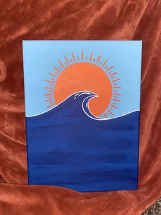 an orange and blue painting with the sun in the sky on it's side