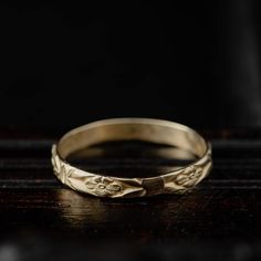 A delicate, flower patterned ring in solid 14K gold. Wear alone or stack with more for a boho, luxurious look! Made by hand in our jewellery studio in Greece using traditional silversmithing techniques and tools. Please allow for slight variations between your ring and the one pictured. DETAILS -14K solid gold -Ring's band measures 2.5 mm wide -Polished .585 (14K) is hand stamped in the inner part of the ring -Available in US sizes 3-9 -Made to order within 7-10 business days All our pieces come Moon Phase Ring, Gold Band Wedding Ring, Jewellery Studio, Vintage Inspired Rings, Gold Rings Stackable, Pattern Ring, Etsy Gold Ring, Jewelry Studio, Gold Band Ring