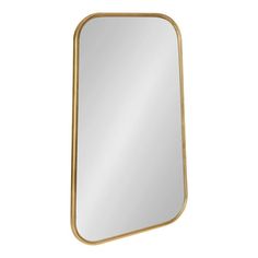 a gold framed mirror on a white background