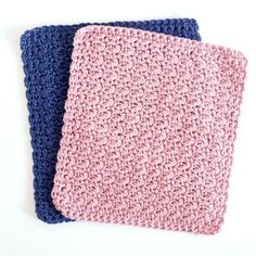 two crocheted dishcloths sitting next to each other