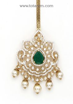 18 Karat Gold "Detachable" Diamond Maang Tikka cum Pendant - Papidi Billa with Color Stones & South Sea Pearls
  This Product can be used as pendant.
  This product has Inter Changeable Stones in the Pendant. 
  Gross Weight of the Pendant without Chain : 12.050 Grams
  Gross Weight of the Chain without Pendant : 2.050 Grams
  Length of the Pendant :1.95 inches
  Width of the Pendant :  1.15 inches


Introducing our exquisite 18 Karat Gold "Detachable" Diamond Maang Tikka cum Pendant - Papidi Bi Traditional Diamond Necklace With Accents For Festive Occasions, Traditional Diamond Pendant Bridal Necklace, Traditional Bridal Necklace With Diamond Accents For Festive Season, Traditional Hand Set Diamond Pendant Necklace, Traditional Yellow Gold Bridal Necklace With Diamond Accents, Traditional Cubic Zirconia Diamond Necklace, Traditional American Diamond Necklace, Traditional Gold Diamond Necklace With Stone Work, Traditional Diamond Jewelry With Detachable Pendant