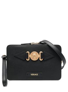 Medusa-Head leather clutch bag from VERSACE featuring black, calf leather, gold-tone hardware, Medusa Head motif, top zip fastening, single shoulder strap, main compartment, internal zip pocket and full lining. Latest Bags, Leather Clutch Bag, Medusa Head, Versace Bags, Croc Leather, Leather Clutch Bags, Leather Messenger Bag, Leather Messenger, Leather Care