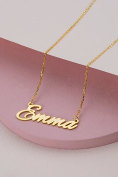 14k 18k 10k Solid Gold Cursive Name Necklace, Personalized Family Name Necklace, Custom Minimal Jewelry, Graduation Gift for Best Friend FEATURES• Solid Gold (real gold, not gold plated or gold filled material)• Gold Karat: 10K (417) - 14K (585) - 18K (750) (optional)• Pendant Height: 0.35 Inches (0.90 cm)• Pendant Width: depending on the text• Available Gold Color: Yellow gold, rose gold and white gold (optional)Wholesale requests are welcome.Our gold necklaces are perfect choice for a Christma Classic Name Pendant Necklace, Dainty 14k Gold Personalized Gift Necklace, Luxury Gold Nameplate Necklace, Elegant Nameplate Charm Necklace For Personalized Gifts, Dainty 14k Gold Necklace For Personalized Gift, Elegant 14k Gold Hallmarked Charm Necklace, Personalized Delicate Yellow Gold Name Necklace, Delicate Personalized Yellow Gold Name Necklace, Classic Pendant Necklace With Name