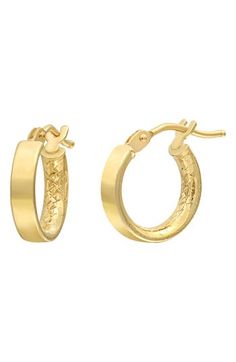 A flat silhouette and textured interior maximize the shine of these handcrafted hoop earrings. 1/2" hoop diameter; 1/8" width Snap-post closure 14k gold Imported Small Hammered Hoop Earrings For Formal Occasions, Formal Small Hoop Earrings With Hammered Detail, Formal Small Hoop Hammered Earrings, 14k Gold Hinged Huggie Hoop Earrings, Gold Hammered Hoop Earrings For Formal Occasions, Elegant Hammered 14k Gold Huggie Earrings, Formal Hammered 14k Gold Hoop Earrings, Formal 14k Gold Hammered Hoop Earrings, Formal Gold Hammered Hoop Earrings