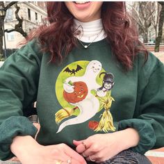 It's beginning to feel like spooky season, and this vintage cat and ghost sweatshirt is adorable and just the crewneck you need for fall! This Vintage style sweatshirt is a great retro option to add to any basic outfit, and also brings on the nostalgia! FAST PRODUCTION AND TURN AROUND TIME WITH A STAR SELLER RATED STORE 💖⭐ SIZING Relaxed fit - size up for a more baggy fit! RETURN POLICY Please check our shop policies FAQ for more info!  About SUGAR FACE GOODS   💖 Woman designed, owned & operat Vintage Halloween Clothes, Cute Halloween Outfits For Women, Cat And Ghost, Thrift List, Cute Halloween Outfits, Halloween Fits, Ghost Sweatshirt, Tshirt Outfit, Teachers Halloween