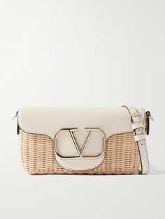 VALENTINO GARAVANI Locò embellished leather-trimmed raffia shoulder bag | NET-A-PORTER Designer Straw Bag With Gold-tone Hardware, Designer Summer Straw Shoulder Bag, Luxury Rectangular Straw Bag With Detachable Strap, Designer Rectangular Straw Bag In Natural Color, Designer Beige Woven Straw Bag, Designer Rectangular Natural Straw Bag, Luxury Natural Shoulder Bag For Shopping, Luxury Rectangular Straw Bag For Shopping, Luxury Rectangular Straw Shopping Bag