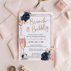 a bridal and bubbly wedding shower party with wine glasses on the table next to it