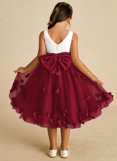 Sprout combines an enchanting A-line shape with a blend of tulle and matte satin. Its sweet scoop neckline and elegant V-back are complemented by a charming zipper closure and adorable bows, creating a delightful look for any little girl on a special occasion. Winter Flower Girl Dress, Winter Flower Girl, Fall Flower Girl, Burgundy Flower Girl Dress, Tea Length Flower Girl Dress, Tea Length Tulle, Military Ball Dresses, Burgundy Bridesmaid, Special Event Dresses