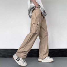 Our Casual Literary Straight Cargo Pants are an essential piece for any stylish look. Boasting a sophisticated solid color and deep pocket detail, these premium pants are the perfect balance of casual and literary. Ideal for any occasion, you'll feel both comfortable and confident in these urban-chic trousers. Features: -100% Cotton -Mid-rise waist -Solid Color -Straight Leg -Regular Fit -Casual style Solid Straight Leg Cargo Pants For Streetwear, Straight Cotton Pants With Multiple Pockets, Cotton Straight Pants With Multiple Pockets, Solid Wide Leg Pants With Pockets For Streetwear, Fall Streetwear Cargo Pants With Welt Pockets, Fall Cargo Pants With Welt Pockets For Streetwear, Streetwear Cargo Pants With Welt Pockets And Straight Leg, Baggy Solid Bottoms With Cargo Pockets, Solid Color Pants With Patch Pockets For Streetwear