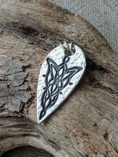 "You can find more silver treasures in my shop! Click here: https://www.etsy.com/shop/SeasideSilverJewels Or follow me on Facebook: https://www.facebook.com/SeasideSilverJewels/ This beautiful Evenstar likeness necklace was inspired by my love for J.R.R. Tolkien's writings and films. The Evenstar is a symbol of hope, love enduring and perseverance. Gift Wrapping: All items are sent gift wrapped as pictured. Reusable burlap sack colors may vary depending on stock. Please message me if you have a Aragorn Necklace, Lotr Necklace, Arwen Lotr, Lotr Jewelry, Aragorn And Arwen, Art Clay Silver, Silver Metal Clay, Hope Symbol, Art Clay