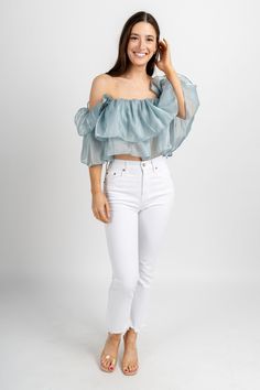 Ruffle off shoulder top from Lush Fashion Lounge women's boutique in Oklahoma City. Lush boutique in OKC has a variety of cute tops and more! Turns heads in this trendy ruffle top! Model is 5'7 size 24 wearing size small. 100% polyester Cute Blouses, Bride Clothes, Off Shoulder Top, Women's Boutique, Trendy Tshirts, Off Shoulder Tops, Oklahoma City, Light Denim, Ruffle Top