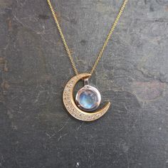 "This unique crescent moon phase pendant is available in silver or 14 k gold. So beautiful polished but equally stunning hand-finished matte, hammered or have it encrusted with diamonds. A focal piece that can be stacked with smaller pendants. It's a slide providing space for a pendant to fit into the opening. We've paired it with our bezel set moonstone. crescent moon 24 millimeters long x 19 mm wide or/ almost 1\" long x 3/4\" wide 14k solid gold or sterling silver pave Diamond encrusted Cresc Full Moon Necklace, Moon Necklace Silver, Crescent Moon Pendant, Celestial Necklace, Rose Gold Diamond Ring, Silver Moon, Layering Necklace, Small Pendant, Halo Diamond Engagement Ring