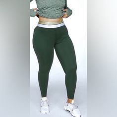 Green High Waist Leggings Green Compression Sportswear Bottoms, Green Full Length Sportswear Bottoms, Sporty Tight Green Pants, Casual Green Compression Pants, Casual Compression Green Pants, Green Tight Sporty Leggings, Sporty Tight Green Leggings, Green Yoga Pants With Elastic Waistband For Sports, Sporty Green Activewear Long Pants