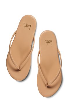 This handmade sandal is crafted from smooth leather and outfitted with a contoured foam footbed. Memory foam cushioning with arch support Leather upper and lining/rubber sole Made in Brazil With every shoe purchased, Beek will donate a meal to a child in need through multiple outside charities Classic Open Toe Flip Flops For Beach, Classic Beach Flip Flops With Textured Footbed, Classic Summer Flip Flops With Cushioned Footbed, Classic Cushioned Flip Flops For Summer, Classic Leather Footbed Flip Flops For Vacation, Classic Open Toe Flip Flops With Cushioned Footbed, Classic Adjustable Synthetic Flip Flops, Classic Leather Flip Flops For Beach, Classic Leather Flip Flops For The Beach