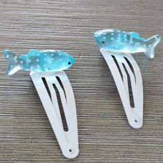 This is a set of aqua blue whale shark hair clips. The hair clips are white. They are 50mm long. You will receive two clips. Spacecore Accessories, White Hair Clip, Shark Hair, Whale Shark, Funky Jewelry, Pretty Jewellery, White Hair, Sharks, Cute Jewelry