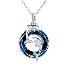 PRICES MAY VARY. 【Meaning of the Dolphin Necklace】Dolphins symbolize playfulness, gentleness, intelligence, good luck and protection. In ancient Greek myth, dolphins were responsible for carrying the souls of the dead to the Islands of the Blessed. In Celtic lore, dolphins were guardians of the sacred waters 【Sterling Silver Dolphin Pendant】Cuoka double dolphin necklace is made of 925 sterling silver and colorful Austrian crystal, which is different from alloy and won’t tarnish and turn green around your neck. It's nickel-free, lead-free, cadmium-free and hypoallergenic, Comfortable to wear and no harm to sensitive skin, never worry about this dolphin jewelry bother you! 【Features of the Dolphin Necklace】Total height of the pendant: 0.68inch/17.5mm. Weight: 0.18oz/5.05g (including the chai Dolphin Design, Dolphin Jewelry, Dolphin Necklace, Blue Circle, Crystal Pendant Necklace, Women Necklace, Crystal Necklace Pendant, Silver Pendant Necklace, Silver Blue