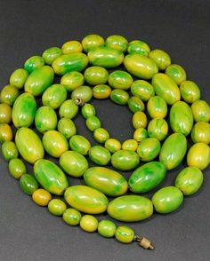 152.5 Grams Antique Bakelite Beads Necklace With Marbled. Very good condition. 68 total beads,all marbled. Yellow color with green veins. Biggest size bead 27.33 mm x 15.35 mm Smaller size bead 10.75 mm x 9.15 mm Length - 120 cm. Bakelite Necklace, Green Veins, Bakelite Jewelry, Glassware Collection, Prayer Beads, Beads Necklace, Vintage Graphics, Vintage Costumes, Yellow Color