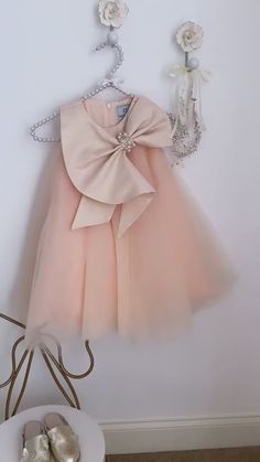 Elegant Embellished Tutu Dress For Dress-up, Elegant Spring Tutu Dress With Bow, Party Princess Dress With Pink Bow, Pink Party Dress With Detachable Bow, Elegant Cream Princess Dress With Tulle Skirt, Elegant Cream Tulle Princess Dress, Elegant Tutu Dress With Satin Bow For Dress-up, Elegant Tulle Tutu Dress With Bow, Pink Bow Dress For Dress-up