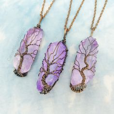 These wire-wrapped tree of life crystal pendant necklaces are handmade with lavender purple aura dyed quartz crystals and antique copper jewelry wire. The pendants come on 2mm antique copper cable chain necklaces with lobster clasps. ~Quartz Crystal Colors~ Each quartz crystal is unique and has varying saturation, shape, and size. Color options are shown in the photos, and you can choose from Bright Lavender, Pastel Lavender, and Dark Lavender. Please refer to the photos to get a feel for the ra Handmade Purple Fairycore Jewelry, Purple Fairycore Jewelry For Gifts, Fairycore Purple Necklace For Gift, Fairycore Purple Jewelry As A Gift, Magical Purple Pendant Necklace, Purple Fairycore Jewelry For Jewelry Making, Mystical Handmade Purple Necklace, Handmade Mystical Purple Necklace, Purple Handmade Magical Jewelry