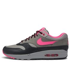 The Nike Air Max 1 "Pink Pow is a collaborative effort between Nike and HUF, a skateboard apparel brand. This eye-catching shoe features a unique colorway of anthracite, pink, medium grey, and flat pewter. Released in June 2024, it boasts a classic silhouette with a mix of materials. The upper combines breathable mesh with stylish suede overlays for a touch of premium flair. The visible Air Max unit in the midsole offers cushioning and a glimpse of Nike technology. This special edition Air Max 1 is perfect for fans of both brands and those who love a distinctive look. Pink Skate Shoes With Contrast Sole For Streetwear, Pink Custom Sneakers With Contrast Sole For Streetwear, Pink Skate Shoes With Contrast Sole For Sports, Nike Custom Pink Sneakers For Light Sports, Pink Custom Sneakers With Gum Sole For Streetwear, Pink Custom Sneakers For Streetwear Athleisure, Pink Custom Sneakers For Streetwear, Pink Gum Sole Sneakers For Streetwear, Pink Casual Custom Sneakers For Streetwear