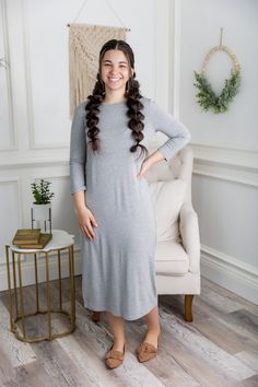 Looking for a modest, classic piece to cover all your modesty layering needs? Our Original Style Midi Layering Dress is back. As always, it is made of the softest cotton knit that was hand-selected for durability and quality. Dress it up or dress it down, the possibilities are endless! Style: Dress, Layering, Midi Length Material: Solids: 95% cotton / 5% spandex | Nuggles Famous Tee Fabric Prints: 95% rayon / 5% spandex | Tiff Fabric Care Instruction: See care label for details. Sizing: Runs true to size. Due to the manufacturing process, slight variations may occur from the posted size chart. Color(s) may differ slightly due to the lighting during the photoshoot and/or screen display.