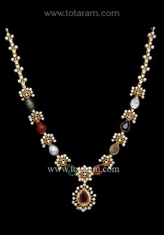 22 karat gold necklace with navrathan stones & cz 
  
    note: this item does not have a diamond in it, the white stone shown is a cz.
  necklace has 8 precious stones which include ruby, emerald, coral, pearl, cats eye, garnet, yellow saphire & blue saphire. - 235-GN4368 - in 25.050 Grams for USD $2,855.74 USD. 
Made in India by Totaram Jewelers Online this product is in Gold - 22 Karat BIS Hallmark 916 Gold  & is an excellent gift for Adult - Women. Ships fully insured with secured guaranteed 22k Gold Necklace With Stone Work As Gift, 22k Gold Temple Necklace With Gemstones, Traditional Multi-stone 22k Gold Necklace, Elegant Gold Multi-stone Temple Necklace, 22k Gold Multi-stone Temple Necklace, 22k Gold Necklace, Antique Jewelry Indian, Ruby Emerald, Cz Necklace