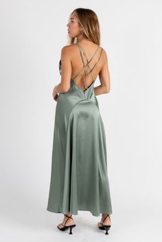 Versatile and timeless, she will never disappoint. The Vision Maxi Dress is made from a satin fabrication. Trimmed in lace with minimal sequin detail and open criss cross strappy back. Color: Light Sage Maxi Length Lace Trim With Minimal Sequin Accents Criss Cross Strappy Open Back Polyester Model Is Wearing Size Small Fitted Satin Slip Dress With Lace Back, Sleeveless Formal Slip Dress With Lace Back, Satin Slip Dress With Bias Cut And Strappy Back, Satin Dress With Tie And Strappy Back, Cross Back Tie Maxi Dress For Night Out, Elegant Satin Cross Back Dress, Wedding Satin Slip Dress With Strappy Back, Night Out Maxi Dress With Tie And Cross Back, Evening Satin Dress With Strappy Back