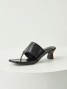 Editor's NotesTheseelegant flip flop sandals are elegant and easy to style- Flip flop sandals- Subtle luster of washed leather- Wooden heels- Square toe- Kitten heelsMeasuremets(in.)- Size: KR220(US5) - KR255(US8.5)- Heel height: 2in.- Fits true to the sizeComposition & Care- Cowhide- Lining: Pig skin- Avoid moisture- Partial clean with a leather cleanerDesigner- Made in Korea- by Byeuuns High-end Black Slip-on Sandals, Black Leather Slip-on Flip Flops, Black T-strap Sandals With Leather Sole And Open Toe, Black Open Toe Kitten Heels With 4-inch Heel, Black Slip-on Synthetic Wedge Sandals, Wooden Heel, Pig Skin, Flip Flop Sandals, Black Sandals