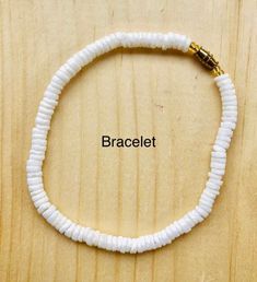 "White puka shell necklace with silver plated screw clasp or lobster clasp in 4 sizes to choose from 14\", 16\", 18\", 20\" . Bright white rounded polished puka beads that measure approximately 1/4\". Now available white puka bracelet (7\") and anklet (10\"). Great addition to your jewelry collection, great gift idea or use it in crafts. Puka shells are gifted to wish good luck to the receiver." Poka Shell Necklace, Kill Devil Hills Nc, Puka Shell Necklace, Shell Choker, Puka Shell, Necklace White, Shell Necklace, Shell Necklaces, Bright White