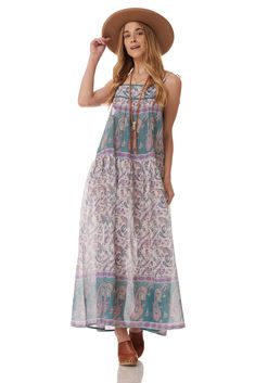 The Betsy long dress is perfect for summer. This dress is designed to be light and flowy. With a beautiful print, this dress is THE must-have item in your wardrobe this season.Color: Teal Size One Size, Fits Size 2 to 10 100% Indian Cotton Made in India Patterned Floral Print Maxi Boho Dress, Flowy Long Sundress For Beach Cover-up, Casual Chiffon Maxi Dress Beach Cover-up, Summer Boho Dress For Garden Party, Hippie Floral Print Patterned Dress, Spring Hippie Maxi Dress With Flowy Skirt, Spring Hippie Flowy Maxi Dress, Hippie Spring Flowy Maxi Dress, Bohemian Multicolor Floral Print Maxi Dress