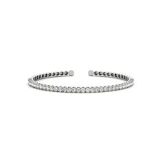 This 14k gold cuff bracelet features a row of pavé diamonds for a subtle but sparkling touch. BRACELET INFORMATION SKU: JNCY70447 Metal type 14k White Gold 14k Yellow Gold 14k Rose Gold Color: White, Yellow, Rose Style: Cuff Bracelet Gender: Unisex Weight (grams): 9.64 Count (appx): 1 Clasp: N/A Rhodium Plated: White Gold Only DIAMOND DETAILS Stone Type: Diamond Creation Type: Lab Grown Shape: Round Color: Near Colorless (F-G) Color Hue: White Clarity: SI1+ Count (appx): 35 Carat Weight: .03 Tot Classic Cuff Bracelet With Diamond Accents, Classic White Gold Cuff Bracelet With Single Cut Diamonds, Classic White Gold Cuff Bracelet With Brilliant Cut, Classic Wedding Cuff Bracelet With Single Cut Diamonds, Classic Cuff Bracelet With Brilliant Cut For Anniversary, Classic Diamond Cuff Bracelet For Formal Occasions, Classic White Gold Diamond Cuff Bracelet, Formal Pavé Setting Bangle, Formal Stackable Diamond Tennis Bracelet