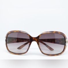 Gucci Brown Havana Gg 3132/S Shell Bamboo Horsebit Rectangular Sunglasses When Aiming For A Sophisticated And Sharp Appearance In Professional And Formal Settings, These Gucci Rectangular Sunglasses Are The Perfect Choice To Leave A Lasting Impact. Crafted From Brown Havana Shell Acetate Frames And Arms, These Sunglasses Stand Out Thanks To The Unique Silver Tone Horsebit Detail On The Temples, Adding A Distinctive Touch To Your Look. In Fair Condition With Signs Of Wear. Scratches And Marks On Lenses/Frame But Nothing That Affects Aesthetic Or Vision. Elegant Brown Sunglasses For Formal Occasions, Formal Gucci Sunglasses With Glass Lenses, Gucci Formal Sunglasses With Uv Protection, Gucci Sunglasses For Beach, Elegant Gucci Sunglasses For Formal Occasions, Formal Gucci Sunglasses, Elegant Silver Sunglasses For Beach, Formal Brown Sunglasses, Gucci Rectangular Sunglasses