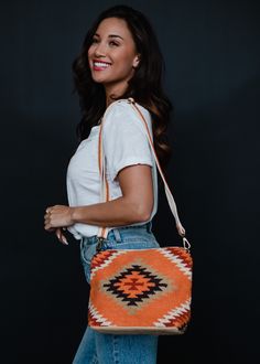 A new bag is always a good idea! This orange and multicolored Aztec inspired crossbody is the perfect option for your casual everyday outings this season. Versatile Orange Shoulder Bag With Removable Pouch, Versatile Orange Crossbody Bag, Casual Orange Shoulder Bag For Daily Use, Versatile Orange Shoulder Bag, Orange Crossbody Shoulder Bag For On-the-go, Orange Crossbody Bag For On-the-go, Trendy Orange Bag For Everyday Use, Versatile Orange Bags For Daily Use, Casual Orange Bag With Zipper Closure