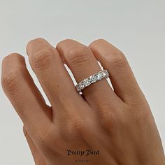 Product Details + Care - Triple Platinum Plating Over 925 Sterling Silver - 8 Carat Total Genuine Moissanite - Wipe Clean Certificate Of Authenticity Included. Photos Pretty Bird Usa Llc 2023 Ig @Prettybird_usa Www.Prettybirdjewelry.Com Dazzling White Eternity Band With Prong Setting, Luxury Gia Certified Round Eternity Band, Cubic Zirconia Eternity Band With Asscher Cut Prong Setting, Prong Setting Diamond White Eternity Band, Diamond White Eternity Band With Prong Setting, Diamond White Round Cut Eternity Band With Prong Setting, White Eternity Band With Prong Setting For Promise, White Moissanite Eternity Band In Fine Jewelry, White Diamond Cut Round Eternity Band