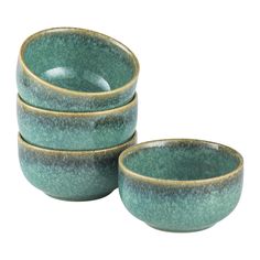 three green bowls sitting next to each other