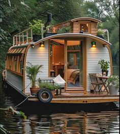 a houseboat is floating on the water