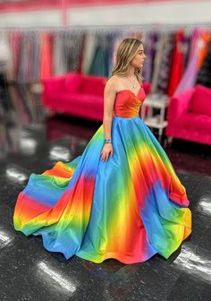 Be the center of attention in this eye-catching Johnathan Kayne 2202 Rainbow Dress. The strapless ombre formal gown features a stunning cut out back with bow details, making you stand out from the crowd. With a super full and unique skirt, this one-of-a-kind dress will make you feel truly special. Size: 4 Color: Rainbow Rainbow Prom Dresses, Strapless Ball Gown For Prom, Strapless Prom Dress With Sweep Train, Strapless Ball Gown For Prom Season Homecoming, Strapless Sweep Train Dress For Debutante Ball And Prom, Elegant Multicolor Prom Season Evening Dress, Elegant Multicolor Evening Dress For Prom, Strapless Sweep Train Dress For Prom Season, Formal Fitted Ombre Dress