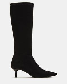 Elevate your style with the ASTORIA, a versatile knee-high boot featuring a sleek pointed toe and a comfortable kitten heel. Perfect for any occasion, this boot adds a sophisticated touch to any outfit. With its timeless design, it's sure to become a staple in your wardrobe. 2 inch heel height Size 6 measurements: 14 inch shaft circumference, 14.25 inch shaft height Size 8 measurements: 14.75 inch shaft circumference, 15 inch shaft height Size 10 measurements: 15.5 inch shaft circumference, 15.7 Kitten Heel Boots, Heel Boot, 2 Inch Heels, Dress Sandals, Kitten Heel, Bridal Shoes, Elevate Your Style, Dress With Boots, Boot Shoes Women