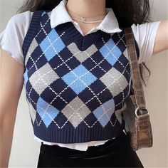 Material: PolyesterStyle: CasualPattern Type: PlaidClothing Length: ShortCollar: V-NeckOrigin: CN(Origin)Season: WinterSleeve Length(cm): SleevelessSleeve Style: RegularThickness: STANDARDGender: WOMENMaterial Composition: PolyesterAge: Ages 18-35 Years OldModel Number: SP2252155FStyle: Fashion,Sexy,Casual,StreetwearSeason: Spring,Summer,Autumn,Winter 2020Color: Black/Blueitem type: pullovers, vestVest Style: England Style, casual Trendy Knitted Winter Vest, Trendy Blue Knit Vest, Casual Winter Vest Cardigan, Trendy Knitted Vest For Fall, Cotton Sweater Vest For Winter, Fitted Winter Sweater Vest, Blue Vest Sweater For Fall, Fitted Sweater Vest For Winter, Blue Vest-style Sweater For Fall