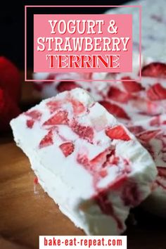 strawberry yogurt and strawberry terrie on a cutting board with strawberries in the background