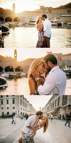 two people are kissing in front of the water and some buildings with boats on it