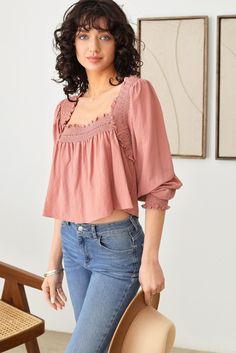 Smocked Detail Shirred Square Neck Puff Sleeve Top - Tasha Apparel Wholesale Spring Feminine Peasant Top With Square Neck, Feminine Square Neck Peasant Top For Spring, Feminine Ruffled Peasant Top With Square Neck, Feminine Smocked Top With Smocked Back For Fall, Feminine Pink Puff Sleeve Top For Fall, Feminine Fall Smocked Top With Smocked Back, Fall Feminine Smocked Top With Smocked Back, Feminine Tops With Smocked Lantern Sleeves, Feminine Tops With Smocked Cuffs And Lantern Sleeves