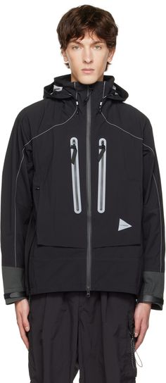 PERTEX SHIELD® nylon ripstop jacket. Reflective trim and contrast stitching throughout. · Water-repellent · Bungee-style drawstring at hood, hem, and back collar · Stand collar · Zip closure · Zip pockets · Reflective logo bonded at front · Zip vent at armscyes · Velcro tab at elasticized cuffs · Unlined Supplier color: Black Colorful Techwear, Reflective Jacket, Sports Suit, Contrast Stitch, Luxury Streetwear, Stand Collar, Water Repellent, Designer Fashion, Rain Jacket