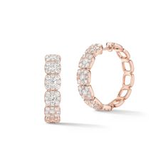 Round off your look with this shimmery hoop earrings set with a halo of diamonds in each link. Hinged post closure. 18k gold, 10.88 grams, 12 round shared prong-set diamonds 1.56 carats, 96 round shared prong-set diamonds 2.43 carats. Earring size 28 millimeter diameter, 6.7 millimeter width. Available in yellow, white, & rose gold. Style number E10842 Please allow 4-6 weeks for delivery if item is not in stock. Diamond Engagement Rings Cushion, Cushion Halo Engagement Ring, Diamond Bar Necklace, Round Off, Cushion Halo, Round Halo Engagement Rings, Oval Diamond Engagement, Engagement Rings Cushion, Oval Diamond Engagement Ring