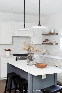 A kitchen island with seating not only adds extra dining options but also maximizes space. In this remodel, we had smaller custom cabinets built to gain extra inches while keeping full-depth end panels. This created the perfect spot for stools to tuck in, enhancing both style and function. Explore how our design blends practicality and aesthetic in this kitchen remodel for a space that's both inviting and efficient! Visit Wildwood Home Co at wildwoodhomecompany.com. Small Kitchen Island, Kitchen Cabinet Styles, Island With Seating