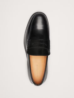 A time-honored classic, this classic loafer comes to life, ready for all seasons with a luxurious leather construction in rich tones.  Leather uppers.  Map-print leather insoles.  Slip-on styling.  Leather soles.  Made in Portugal.  Whole and half sizes. Penny Loafer, Penny Loafers, Printed Leather, Map Print, All Seasons, Penny, Banana Republic, Leather Upper, Portugal