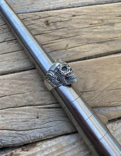 Warrior skull ring in sterling silver, ring is 1 1/8"tall by 3/4"wide..very detailed ring, ring was cast in sterling silver and is a size 9 but can be sized from size 8 to a size 10, so when ordering just put the ring size in the notes or messages on the order page...thanks Bill Symbolic Engraved Skull Ring, Collectible Silver Skull Ring With Oxidized Finish, Silver Skull-shaped Engraved Rings, Hand Cast Sterling Silver Skull Ring, Silver Engraved Skull Ring, Silver Oxidized Skull Ring, Gothic Sterling Silver Skull Ring With Oxidized Finish, Gothic Oxidized Sterling Silver Skull Ring, Collectible Sterling Silver Skull Ring